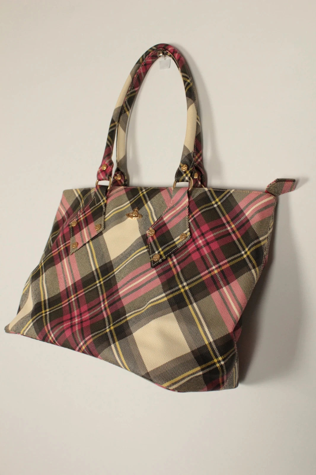 Vivienne Westwood multi checkered handbag with iconic Orb logo and leather accents.