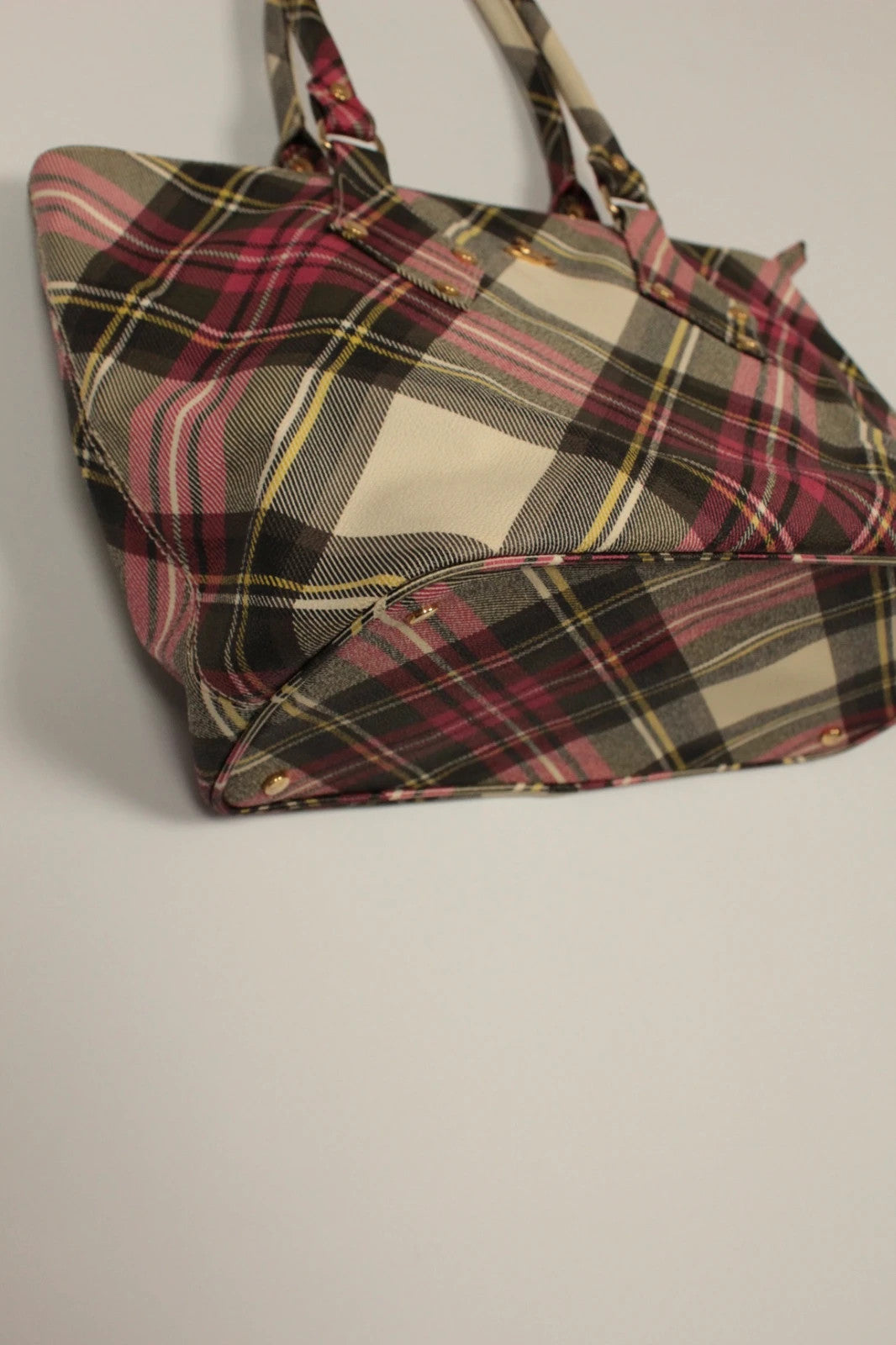 Vivienne Westwood multi checkered handbag with iconic Orb logo and leather accents.