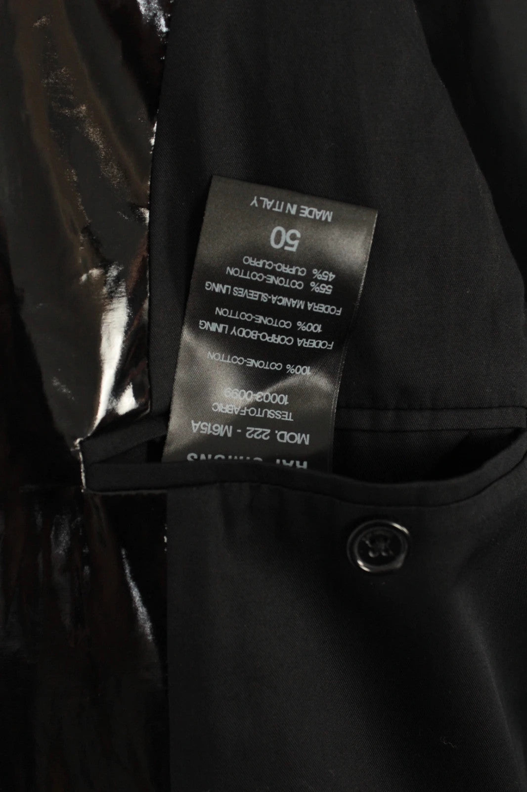 Raf Simons black double-breasted trench coat glossy PVC finish with notched lapels.