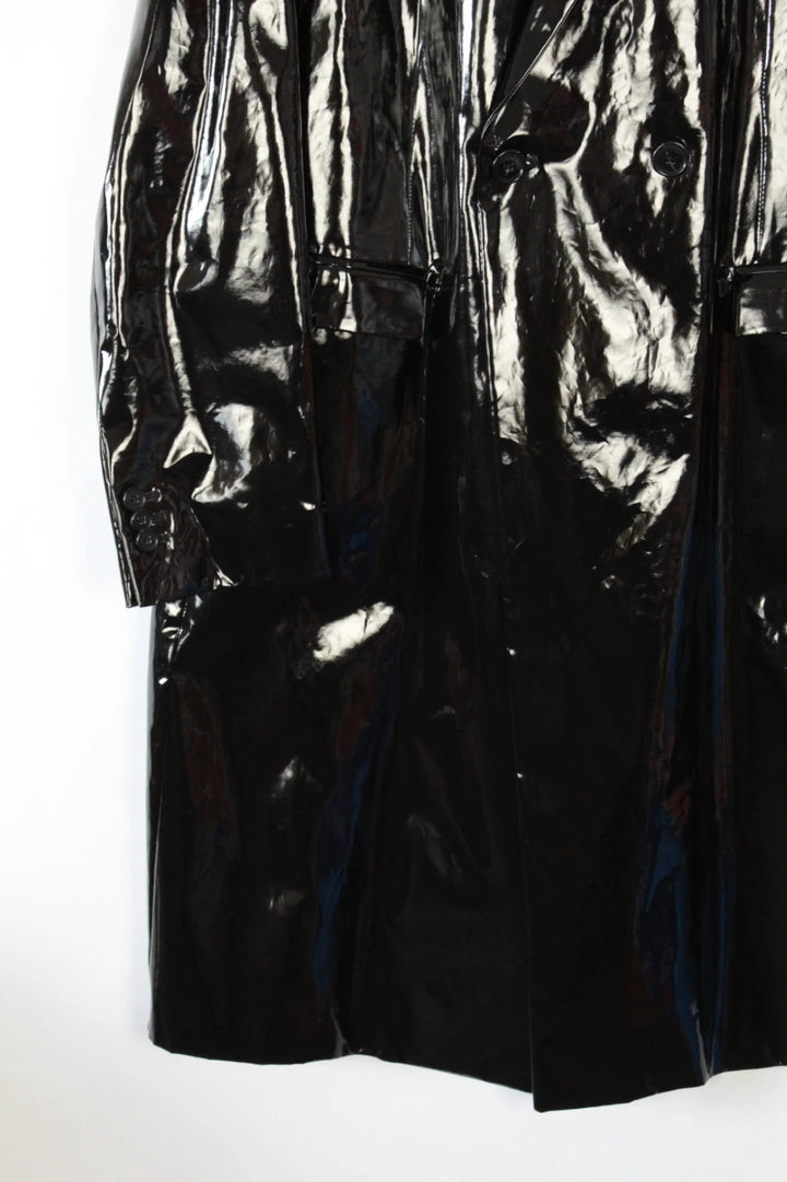 Raf Simons black double-breasted trench coat glossy PVC finish with notched lapels.