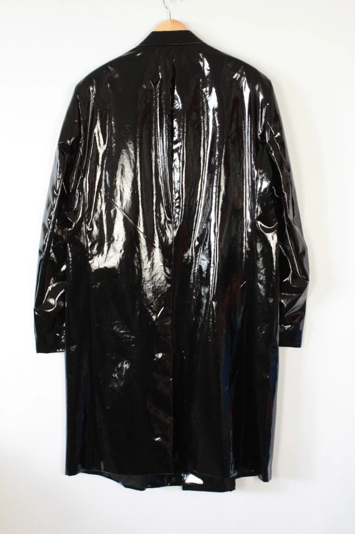 Raf Simons black double-breasted trench coat glossy PVC finish with notched lapels.
