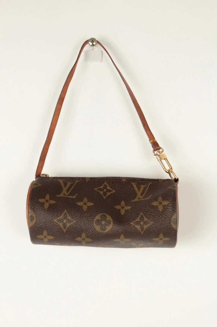 Louis Vuitton black and brown monogram micro mini pouch bag with vachetta leather trim.