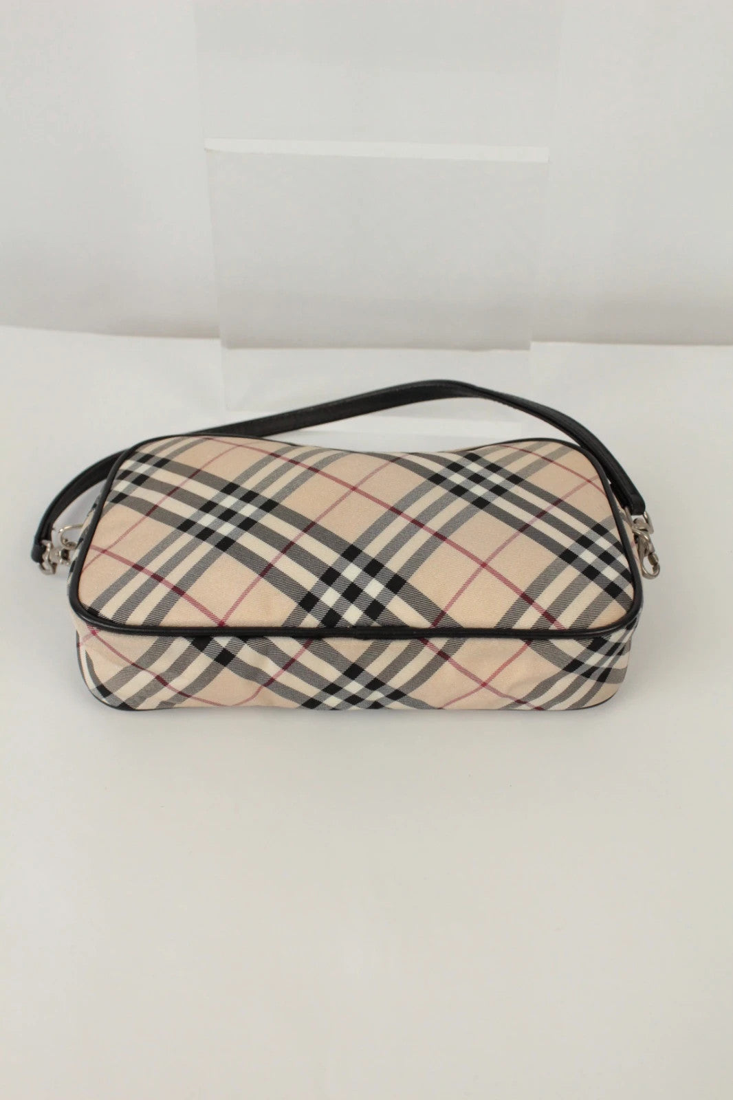 Burberry beige Nova Check mini handbag with black leather trim and silver-tone hardware.