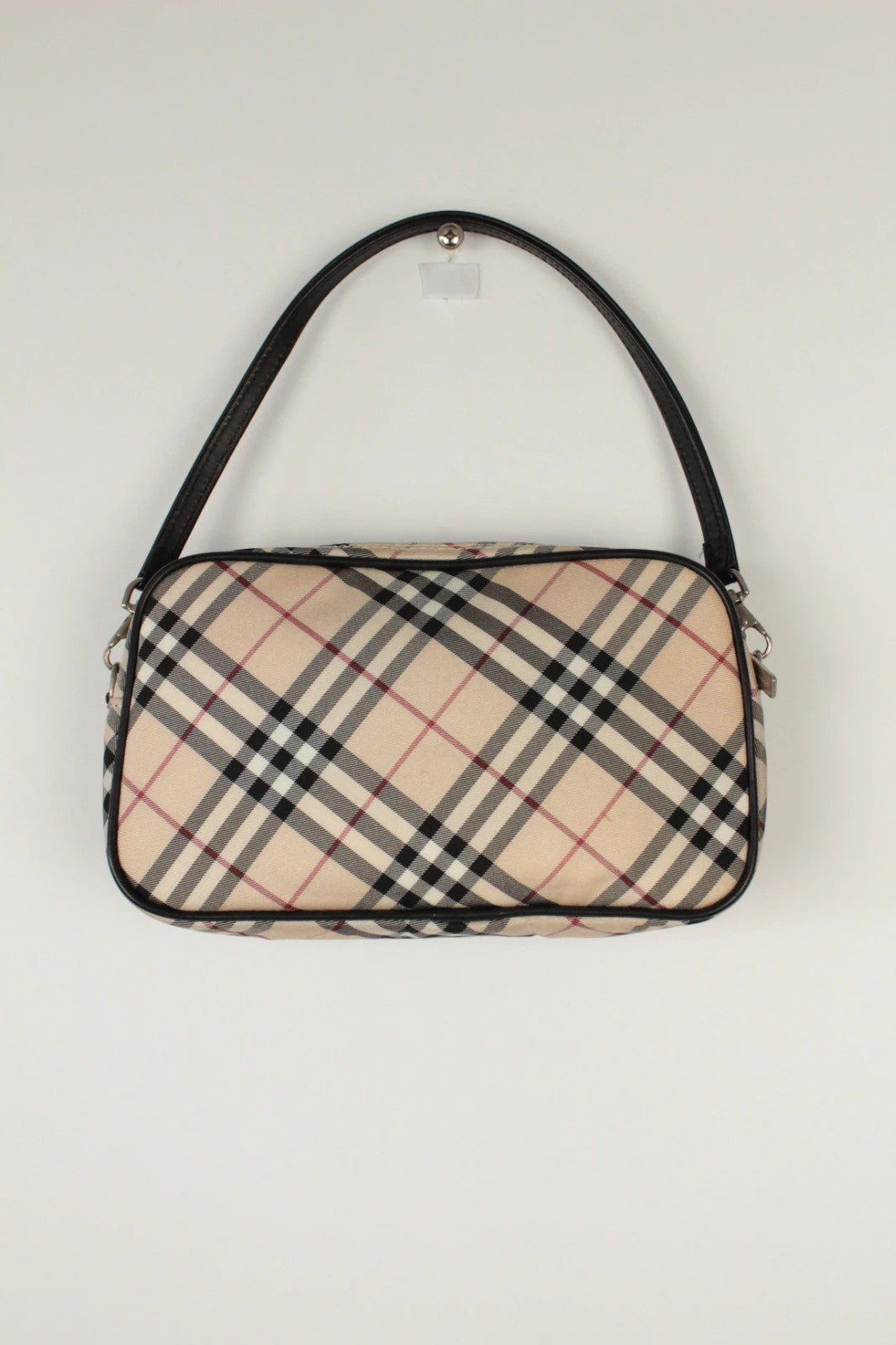Burberry beige Nova Check mini handbag with black leather trim and silver-tone hardware.