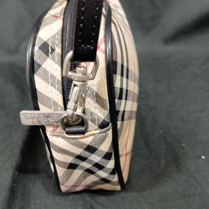 Burberry beige Nova Check mini handbag with black leather trim and silver-tone hardware.