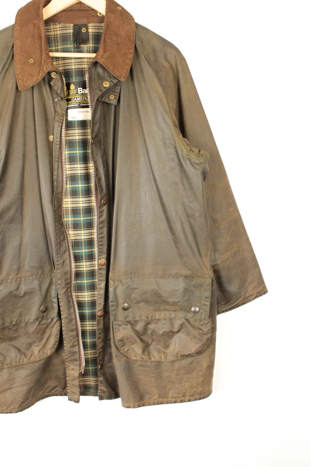 Barbour khaki wax jacket with corduroy collar and 2-Crest inner label.