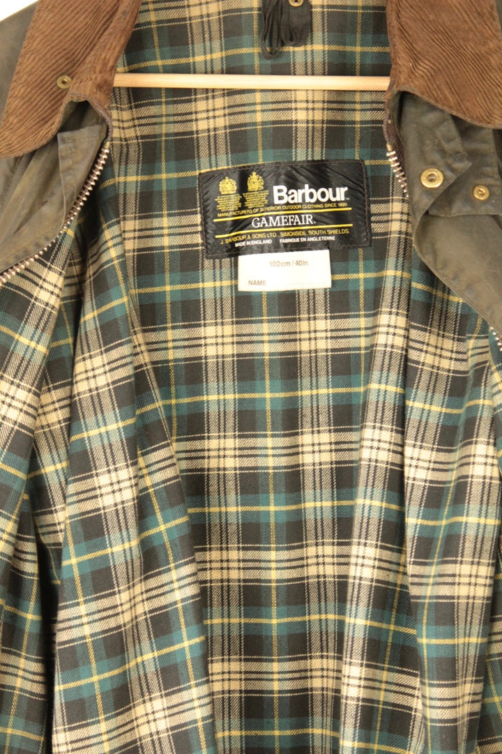 Barbour khaki wax jacket with corduroy collar and 2-Crest inner label.
