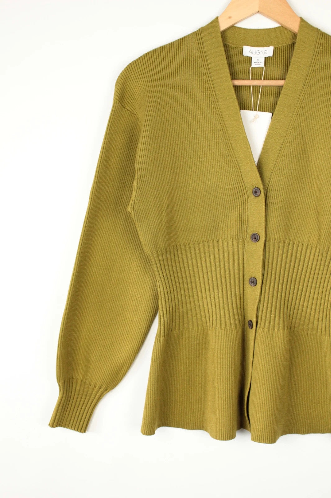 Aligne khaki knit cardigan with flawless stitch details and hardware buttons.