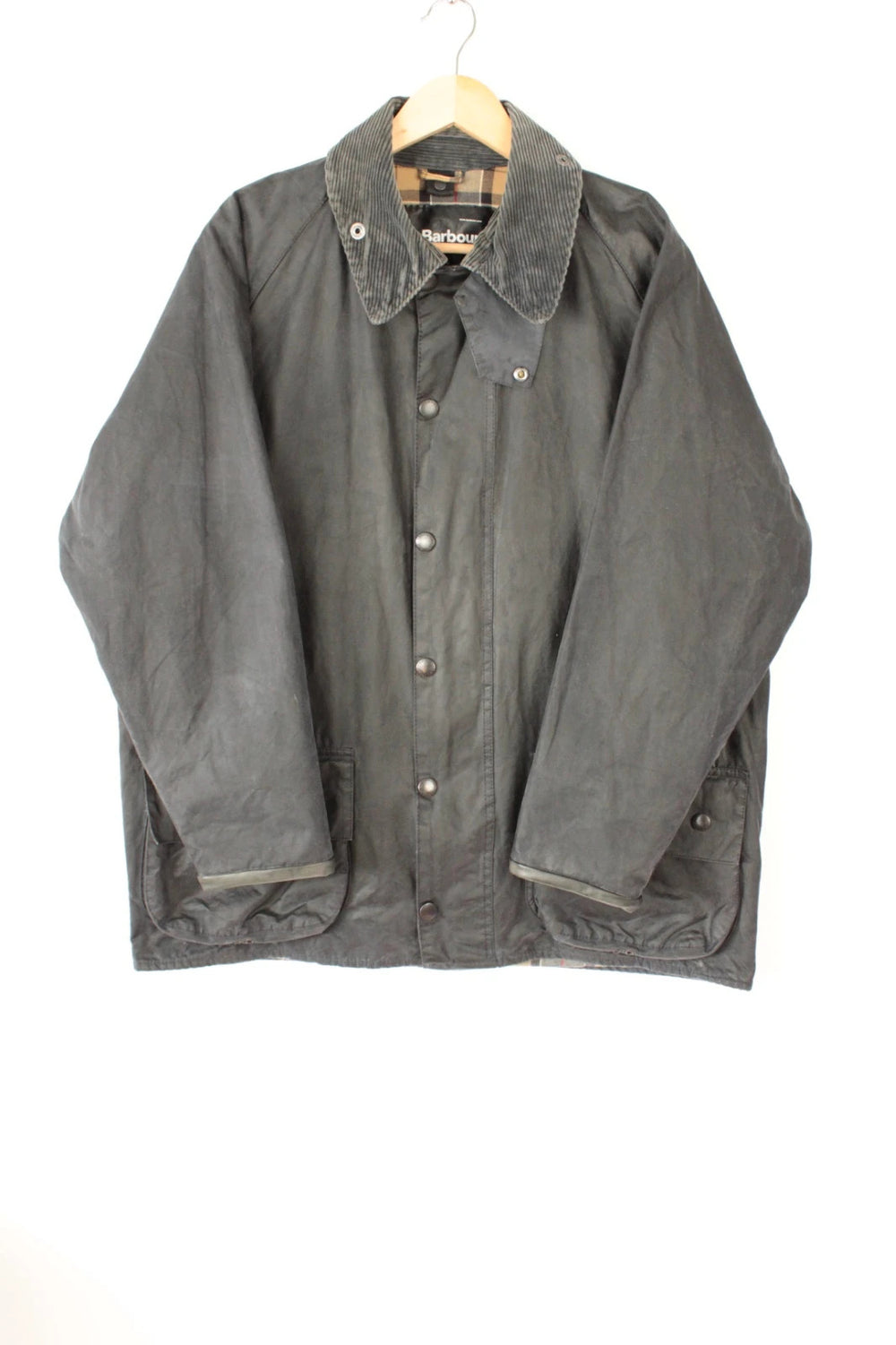 Barbour grey Beaufort wax jacket with navy pocket panels and thick corduroy collar.