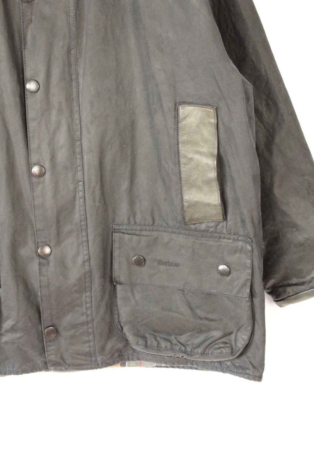 Barbour grey Beaufort wax jacket with navy pocket panels and thick corduroy collar.