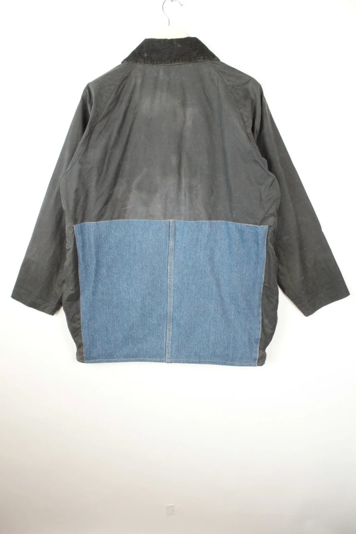Barbour black and navy waxed cotton jacket with corduroy collar and Levi's patchwork details.