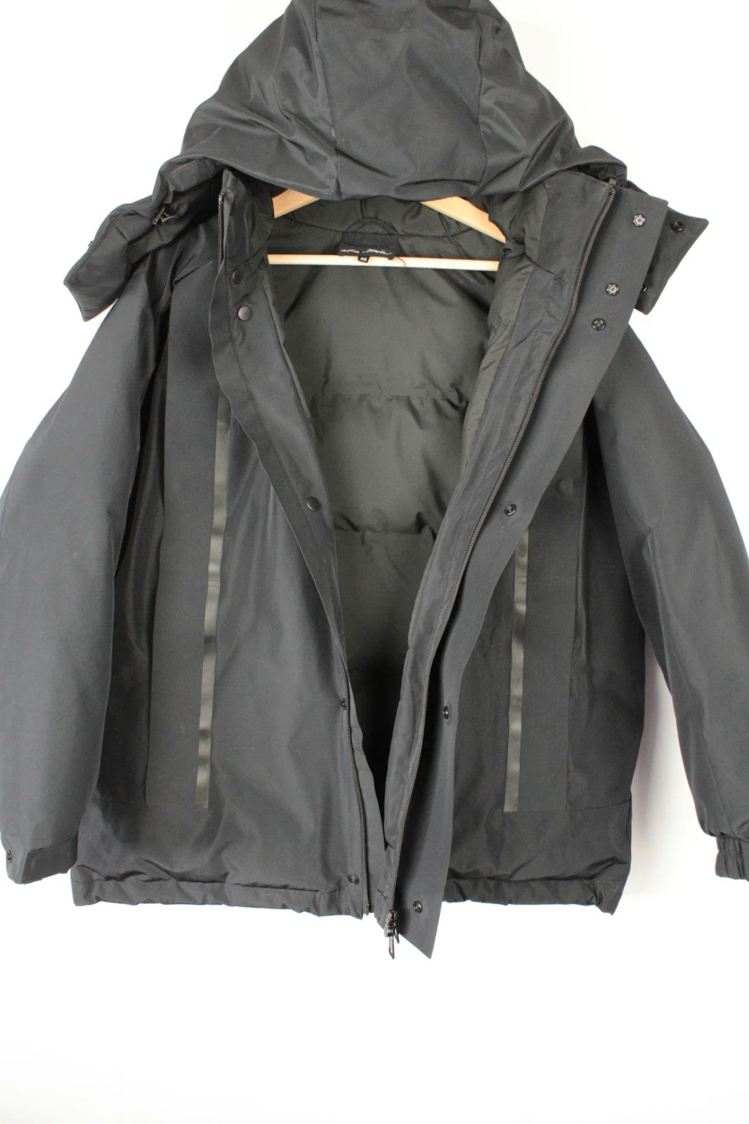 3.1 Phillip Lim black oversized puffer coat with premium nylon taffeta and minimalist design.