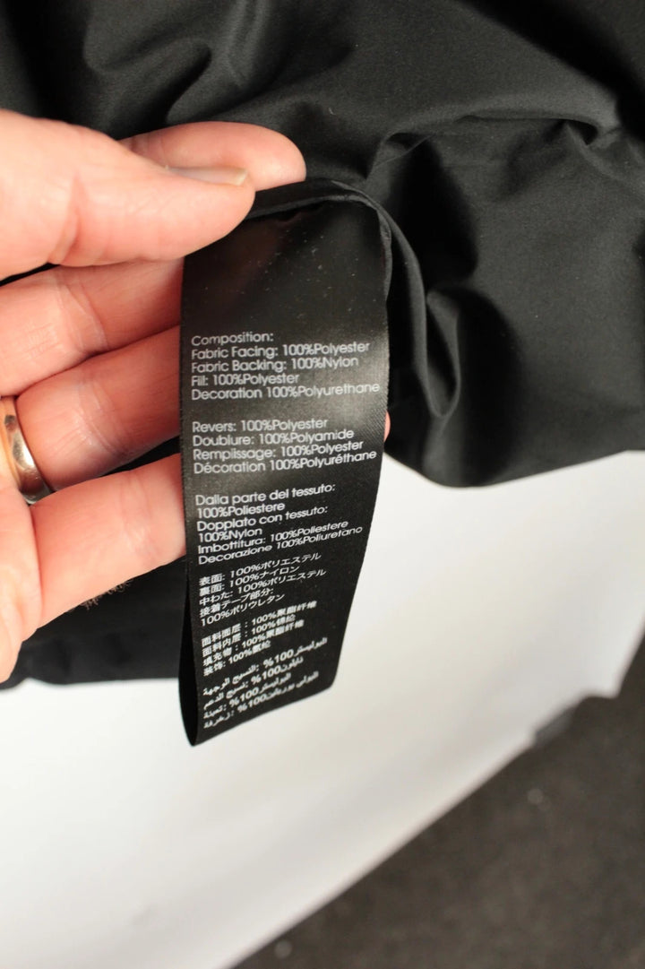 3.1 Phillip Lim black oversized puffer coat with premium nylon taffeta and minimalist design.