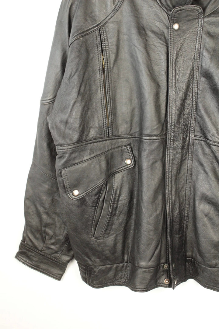 Vintage Dressing black leather bomber jacket with geometric panel stitching and multi-pocket design.