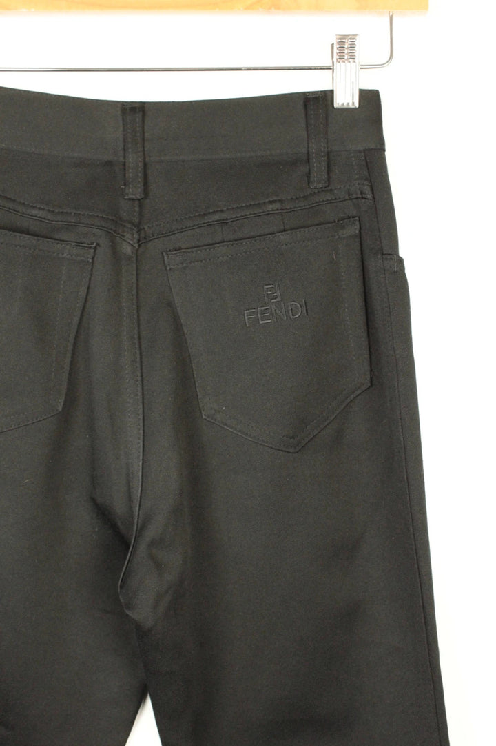 Fendi black wide-leg trousers, high-waisted, premium polyester fabric, 1990s vintage style.