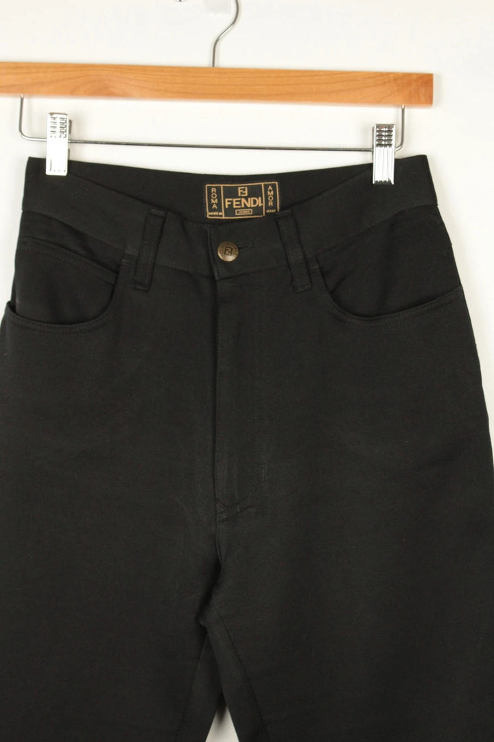 Fendi black wide-leg trousers, high-waisted, premium polyester fabric, 1990s vintage style.