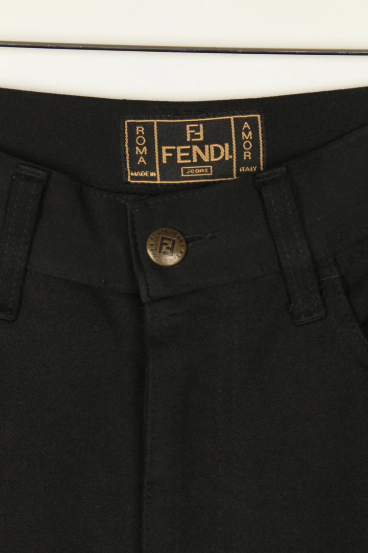 Fendi black wide-leg trousers, high-waisted, premium polyester fabric, 1990s vintage style.