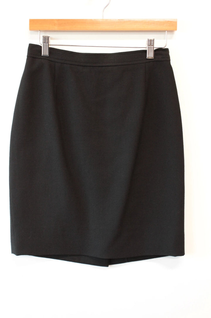 Valentino black wool pencil skirt tailored high waisted with rear vent and zip closure.