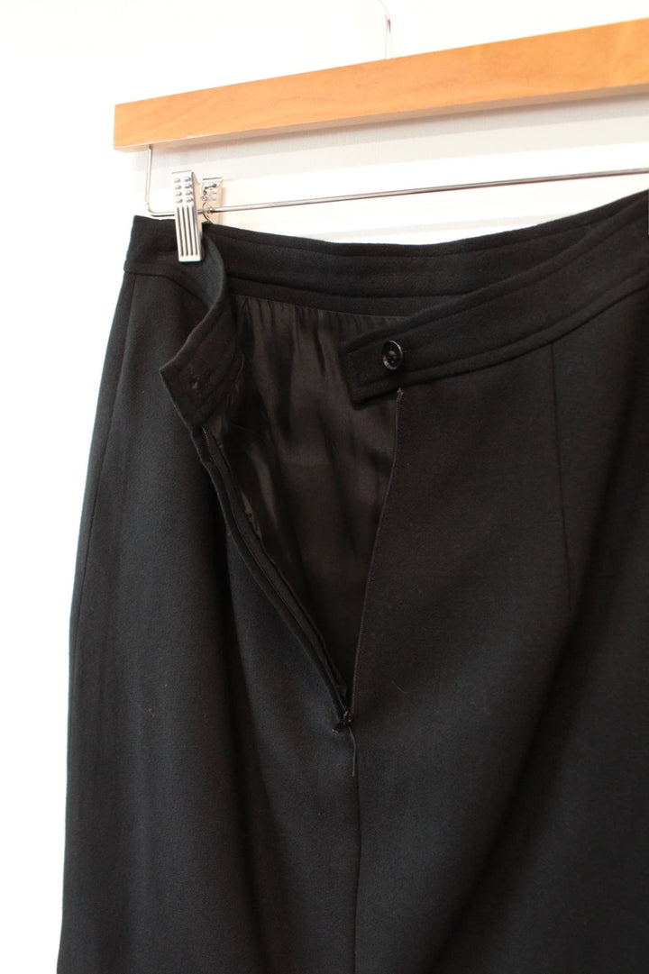 Valentino black wool pencil skirt tailored high waisted with rear vent and zip closure.