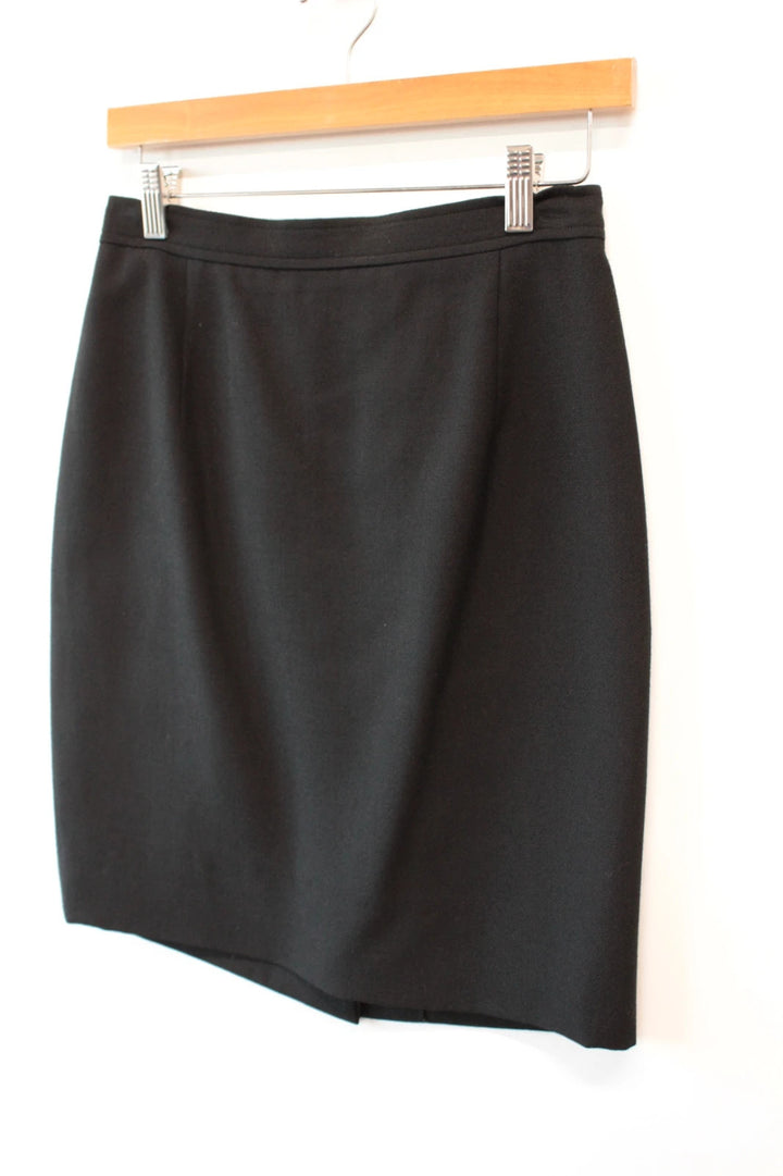 Valentino black wool pencil skirt tailored high waisted with rear vent and zip closure.