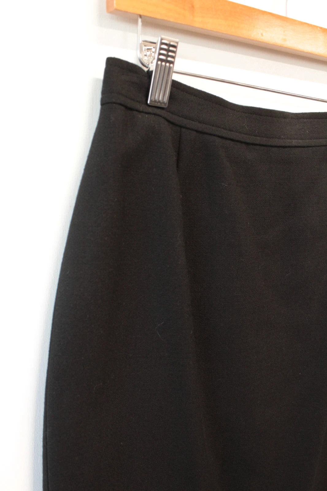 Valentino black wool pencil skirt tailored high waisted with rear vent and zip closure.