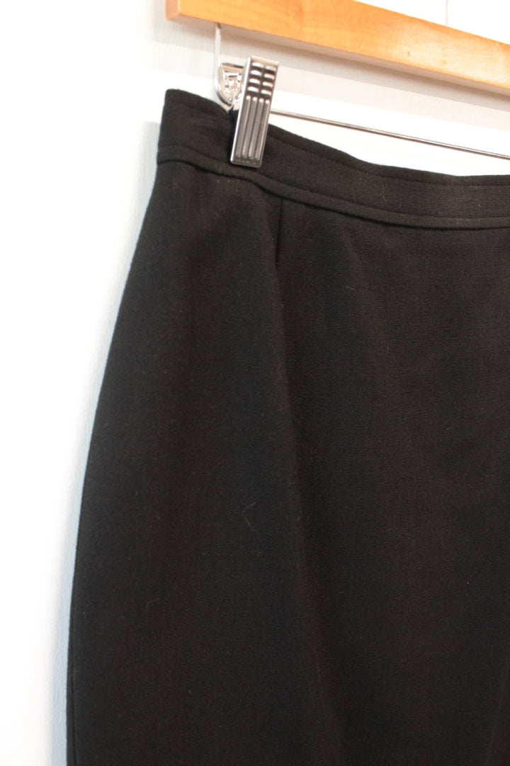 Valentino black wool pencil skirt tailored high waisted with rear vent and zip closure.