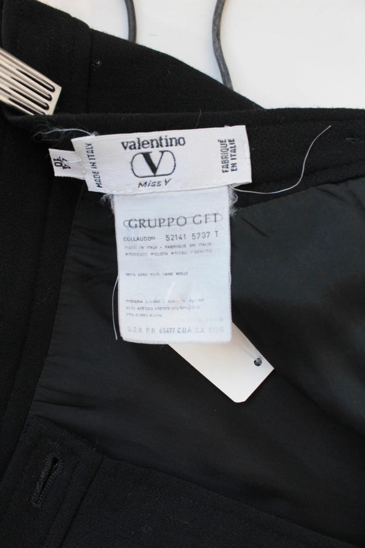 Valentino black wool pencil skirt tailored high waisted with rear vent and zip closure.
