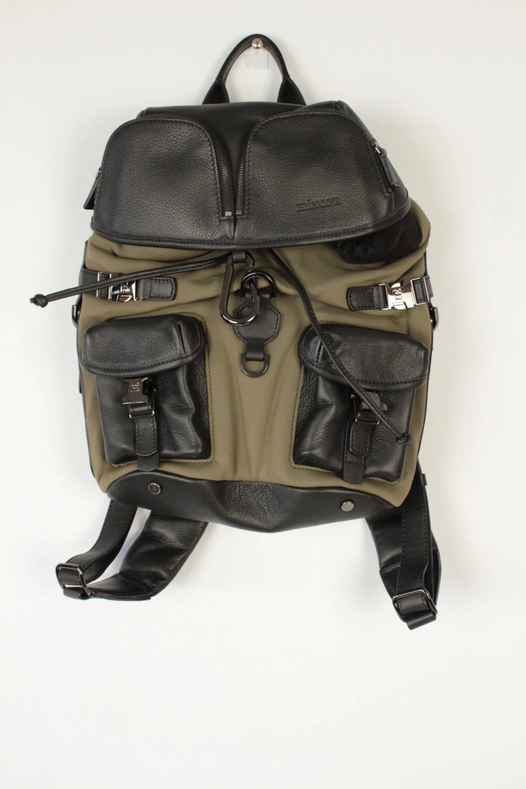 Hènope black and military green neoprene backpack with calf leather trim and gunmetal hardware.