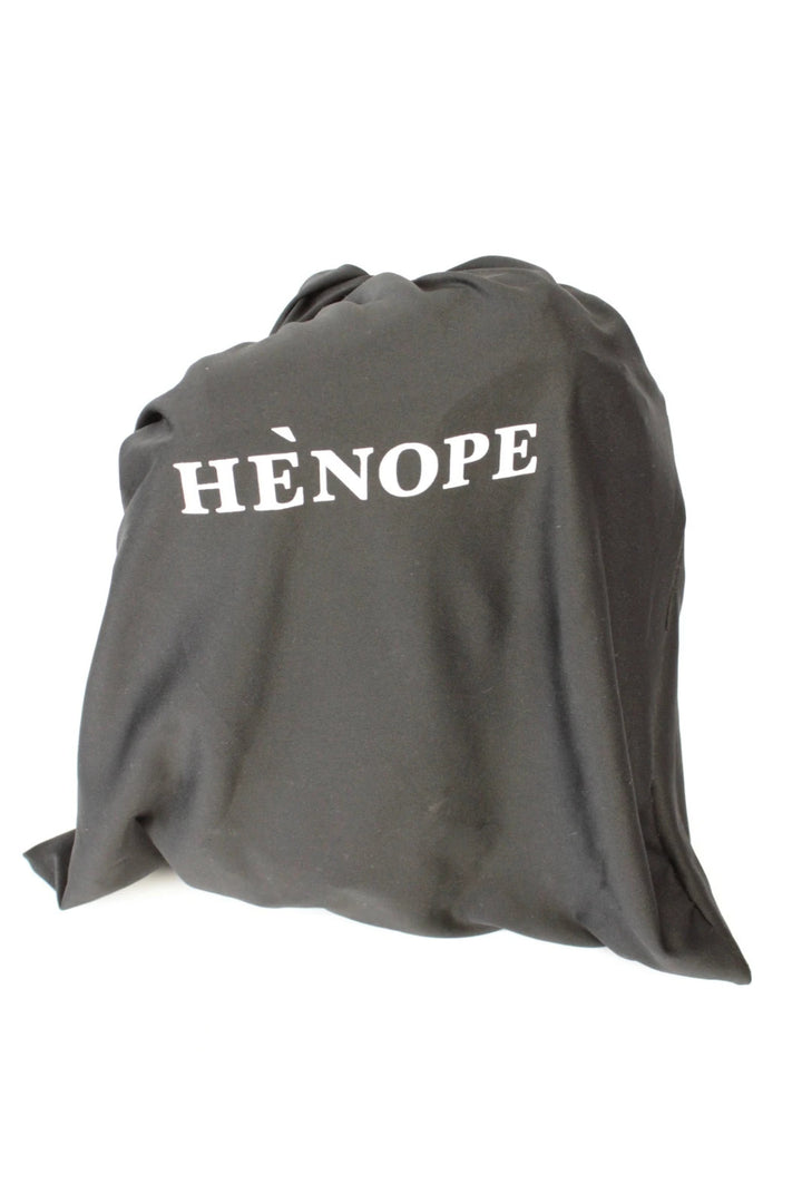 Hènope black and military green neoprene backpack with calf leather trim and gunmetal hardware.