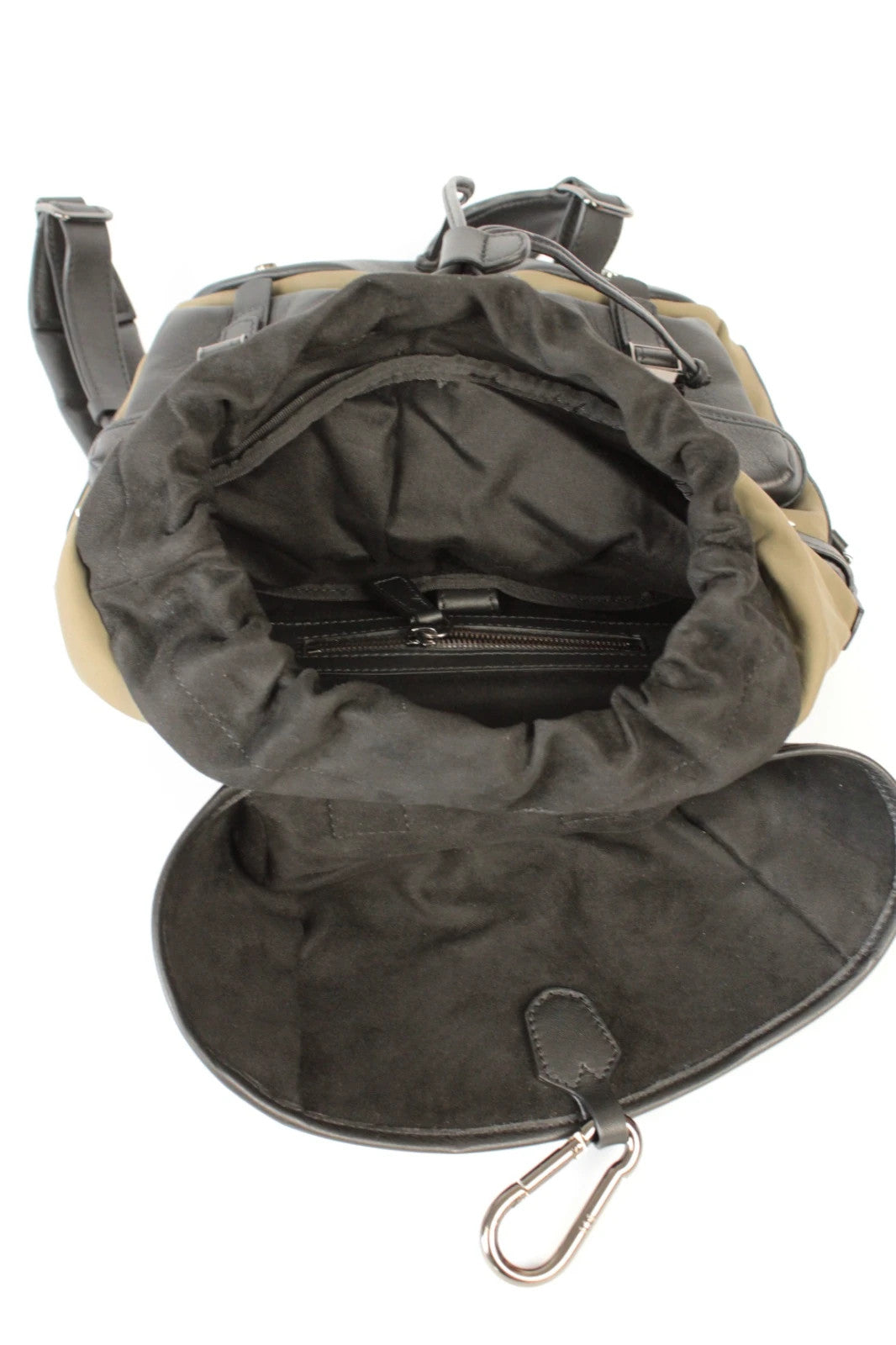 Hènope black and military green neoprene backpack with calf leather trim and gunmetal hardware.