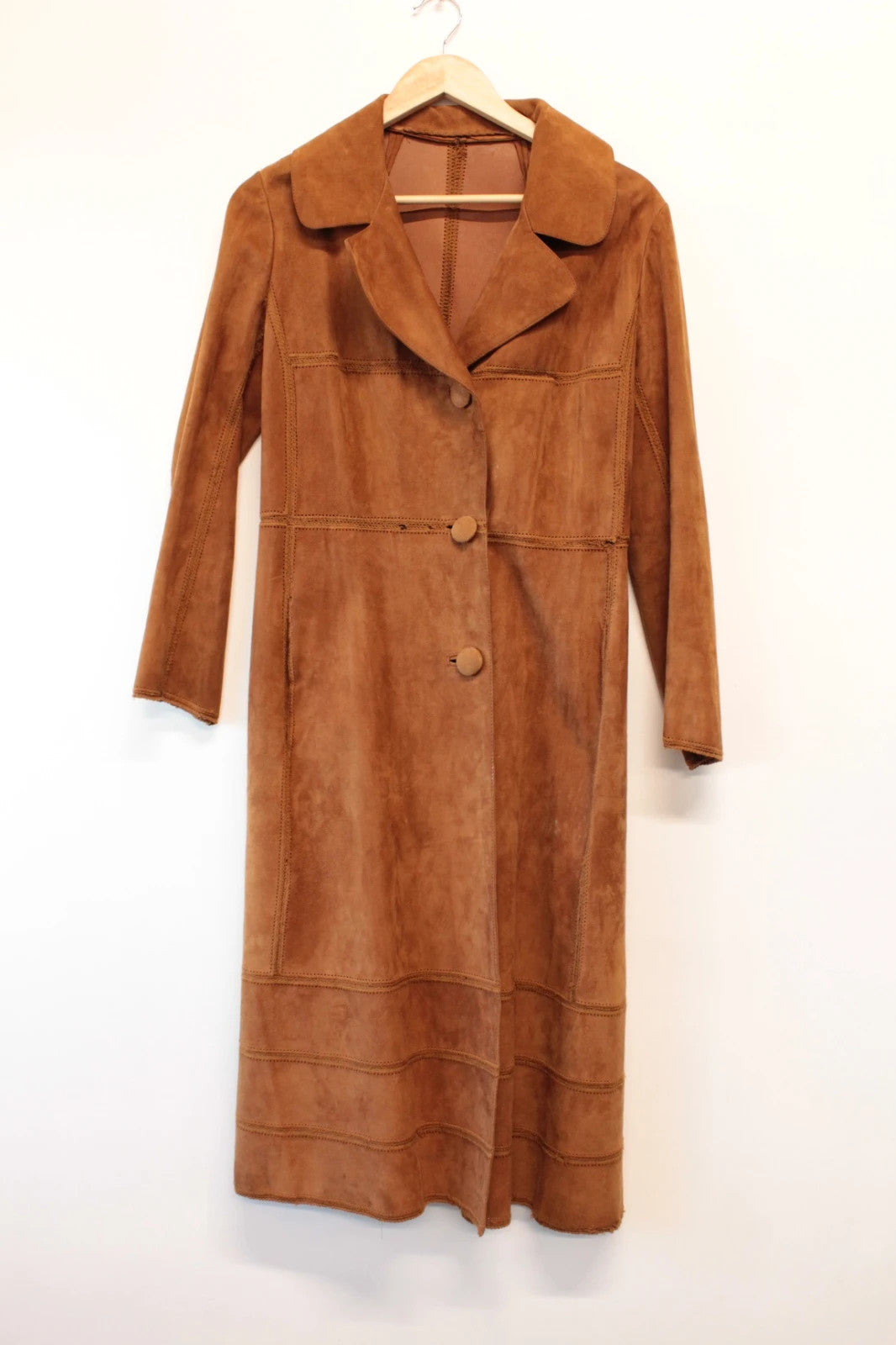 Suede tan brown trench coat with full-length design and premium satin lining.