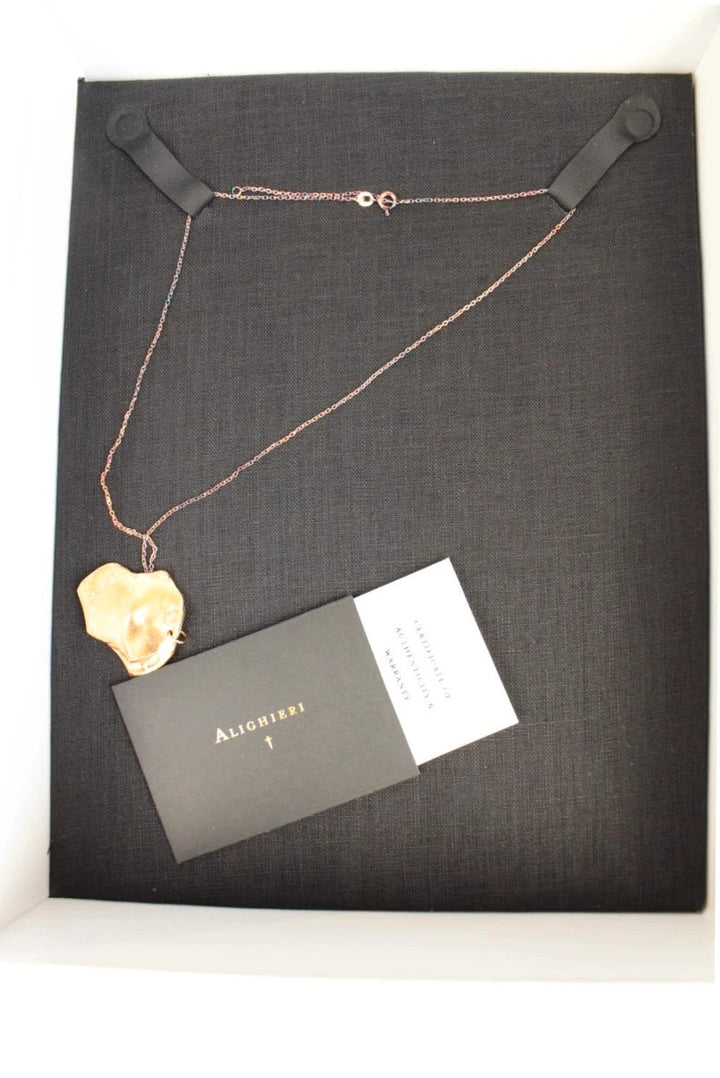 Alighieri gold molten pendant necklace with textured abstract design and presentation box.