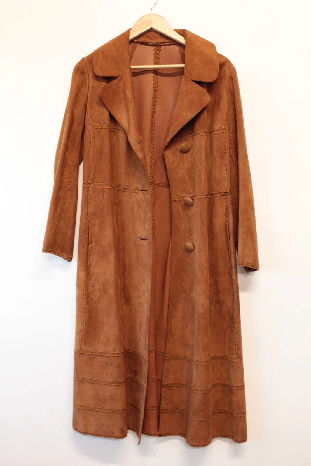 Suede tan brown trench coat with full-length design and premium satin lining.
