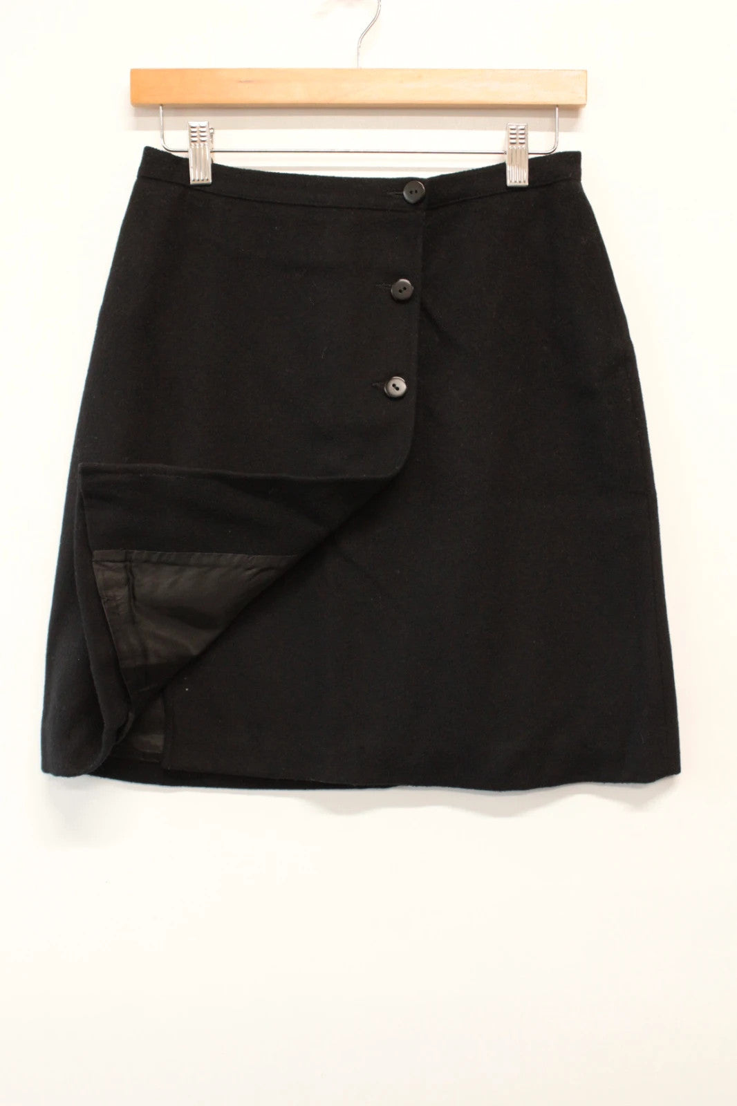 Marella black wool mini skirt tailored button front asymmetric wrap design.