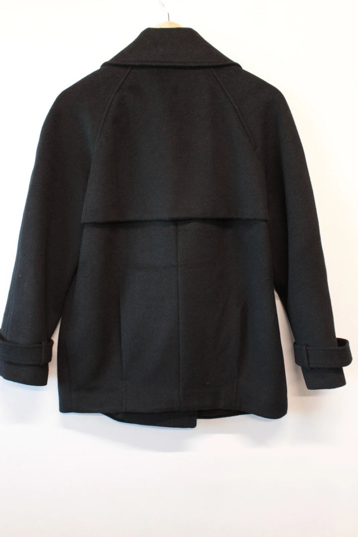 Karen Millen black double-breasted pea coat with tailored silhouette and gold hanging chain.