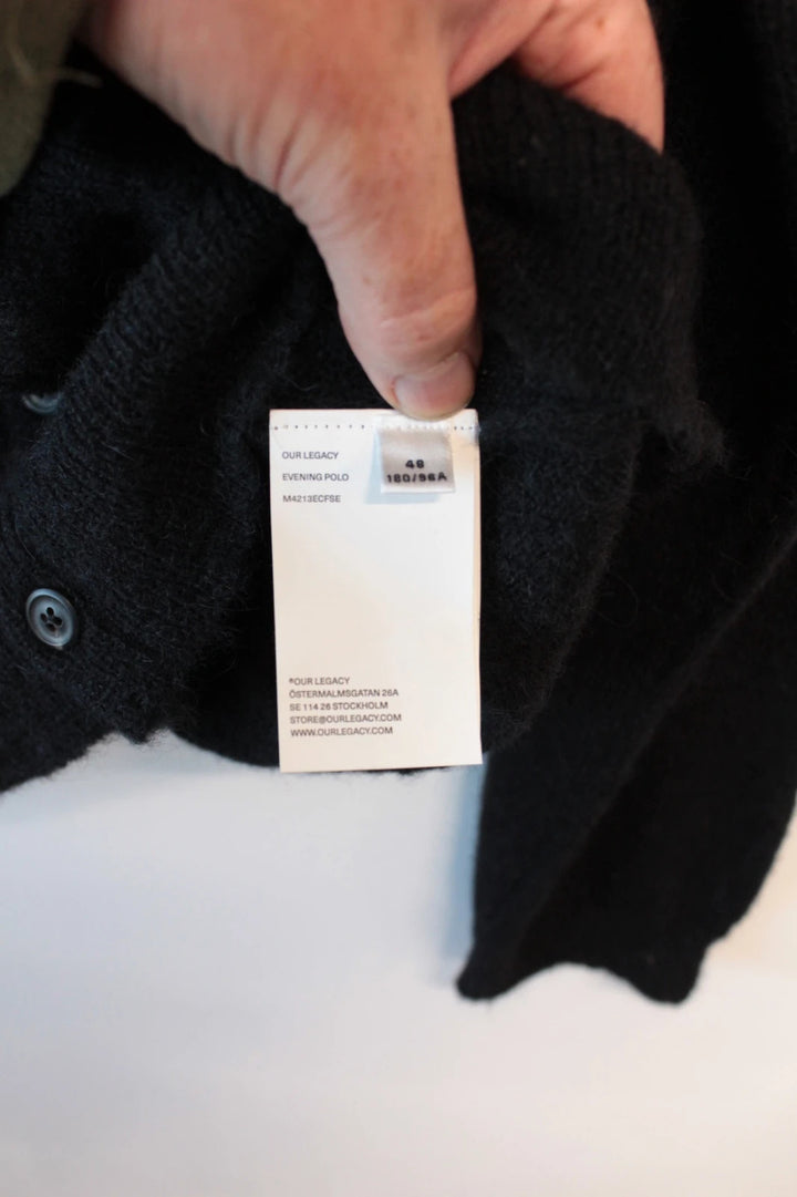 Our Legacy black mohair cardigan with classic collar and tonal buttons.