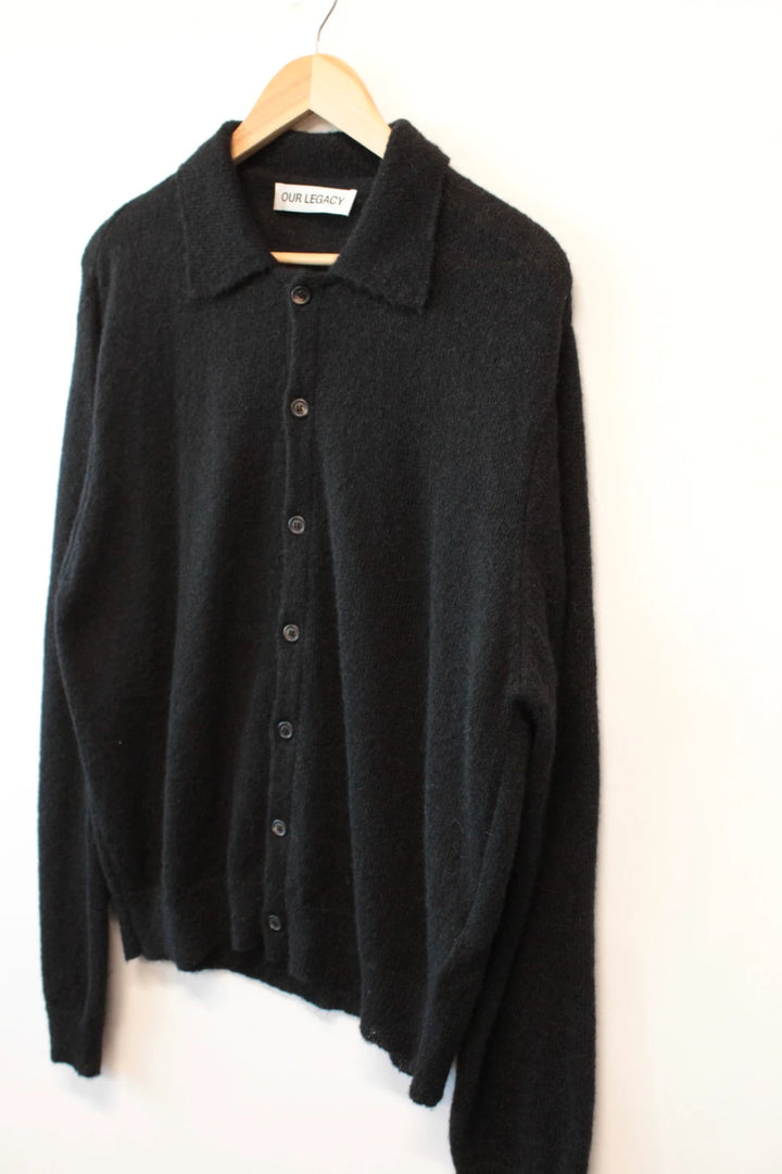 Our Legacy black mohair cardigan with classic collar and tonal buttons.