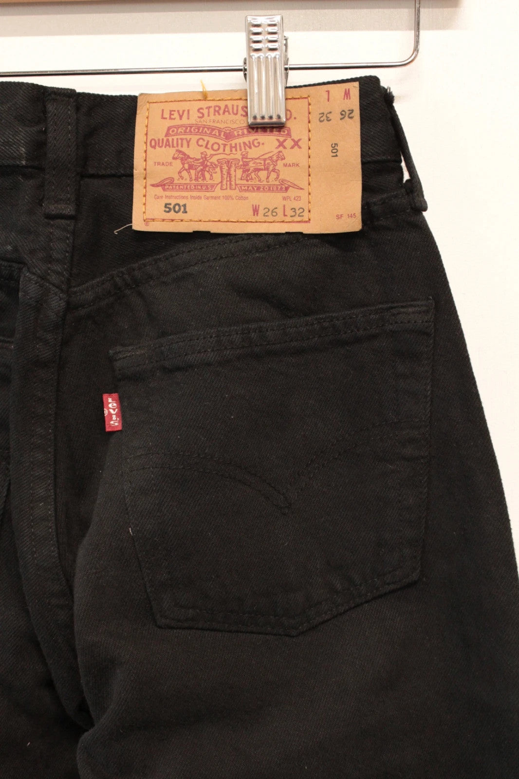 Levi's black straight jeans 501 original button fly, heavyweight rigid denim, pristine condition.