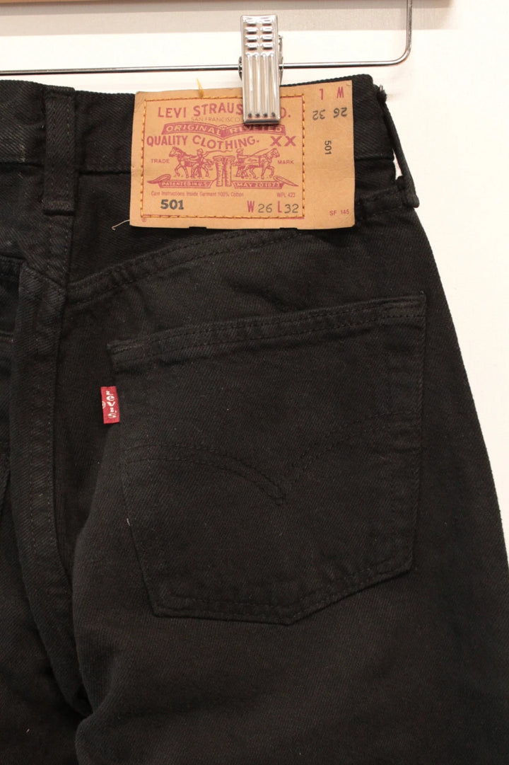 Levi's black straight jeans 501 original button fly, heavyweight rigid denim, pristine condition.