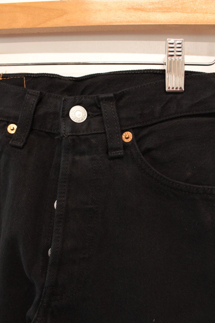 Levi's black straight jeans 501 original button fly, heavyweight rigid denim, pristine condition.