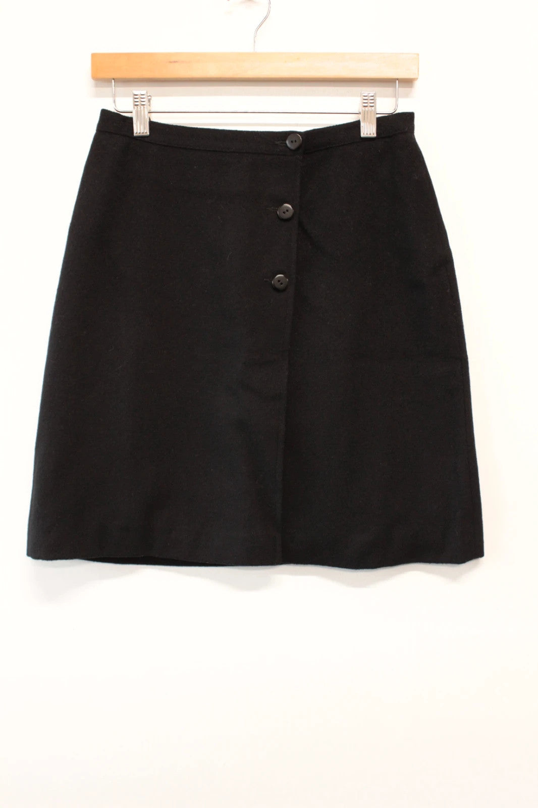Marella black wool mini skirt tailored button front asymmetric wrap design.
