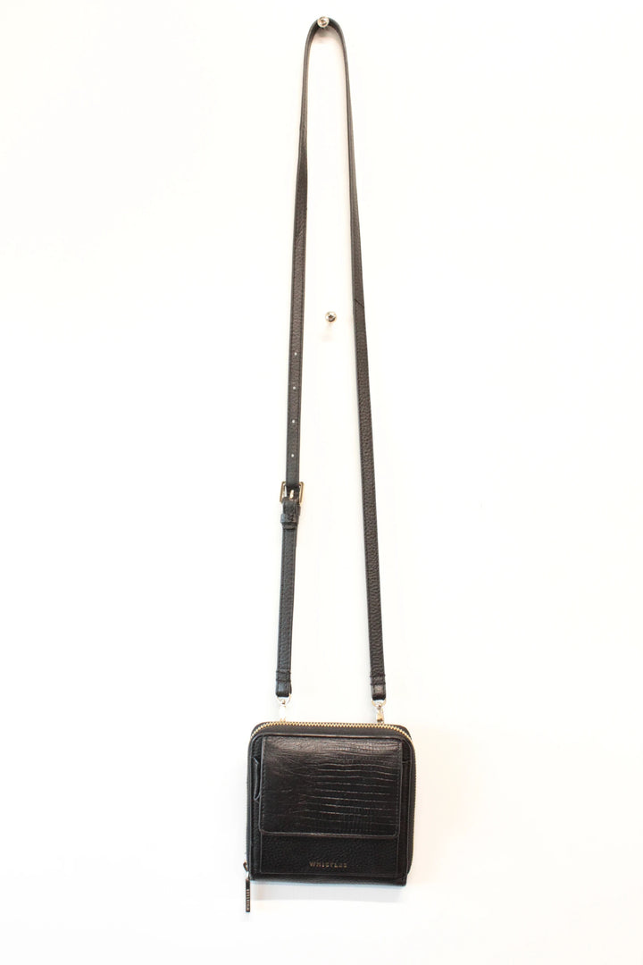 Whistles black lizard effect leather crossbody bag with gold-tone logo and zip hardware.