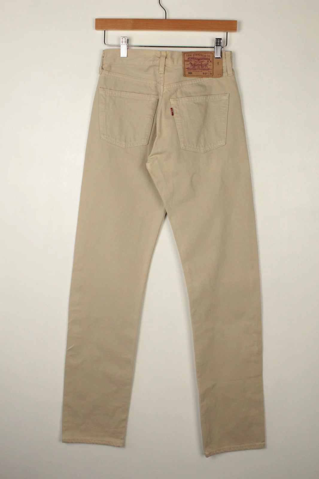 Levi's beige straight jeans with button fly and vintage 501 label, made in France.