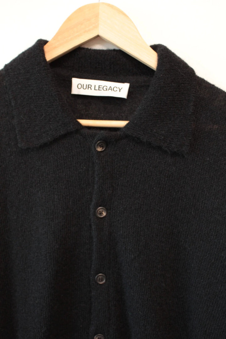 Our Legacy black mohair cardigan with classic collar and tonal buttons.