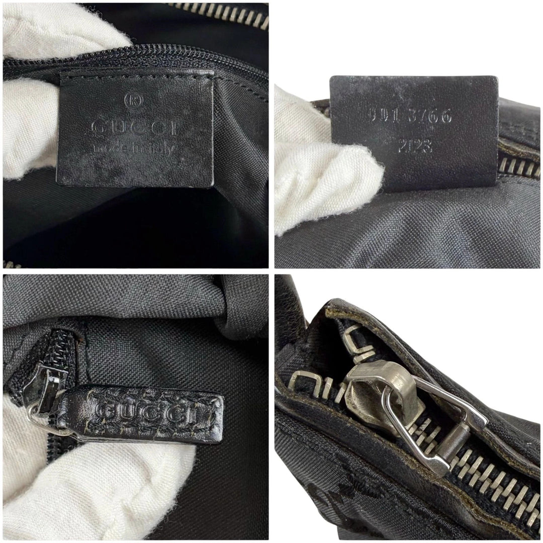 Gucci black hobo bag with GG monogram canvas, calf leather trim, and silver-tone hardware.
