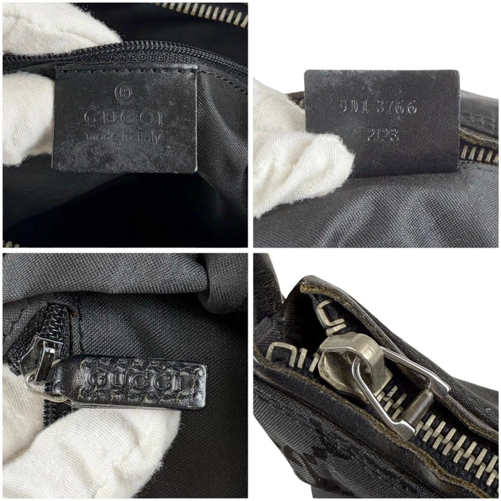 Gucci black hobo bag with GG monogram canvas, calf leather trim, and silver-tone hardware.