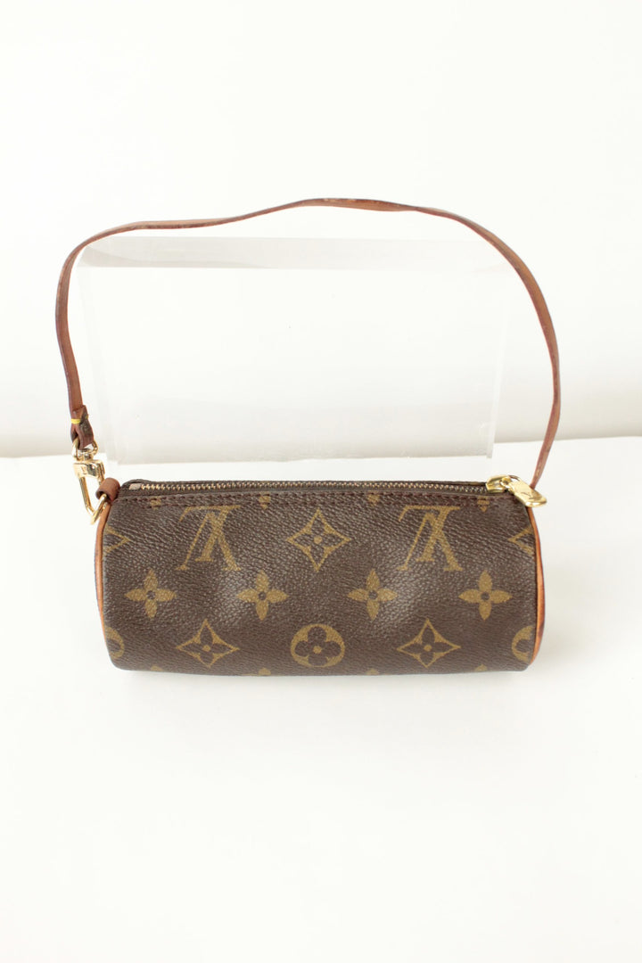 Louis Vuitton brown micro mini pouch bag with monogram pattern and vachetta leather trim.
