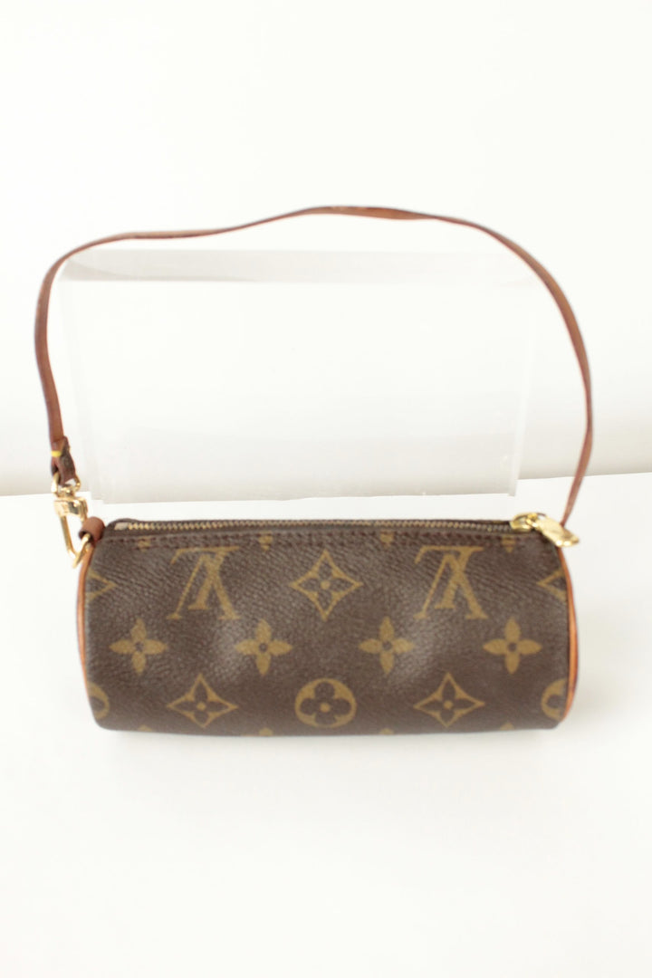 Louis Vuitton brown micro mini pouch bag with monogram pattern and vachetta leather trim.