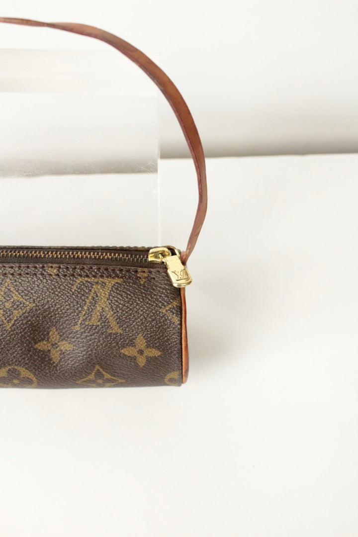 Louis Vuitton brown micro mini pouch bag with monogram pattern and vachetta leather trim.