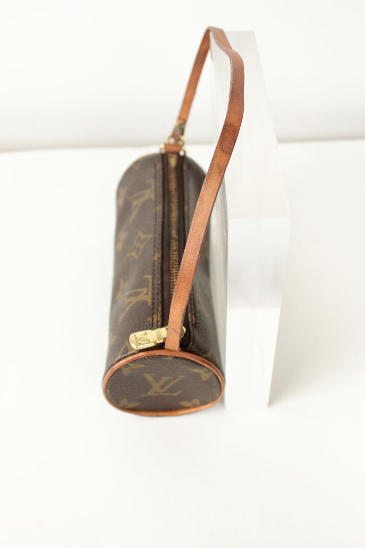 Louis Vuitton brown micro mini pouch bag with monogram pattern and vachetta leather trim.